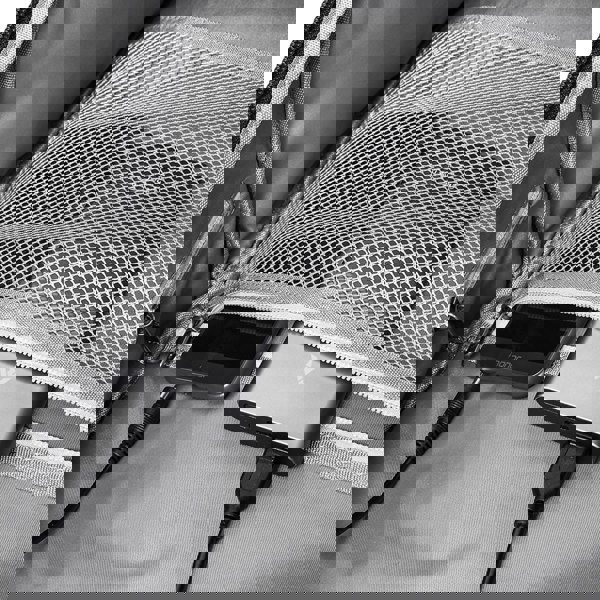 Portable charger plugged into a backpack with a smartphone on top best travel laptop backpack multi-functional