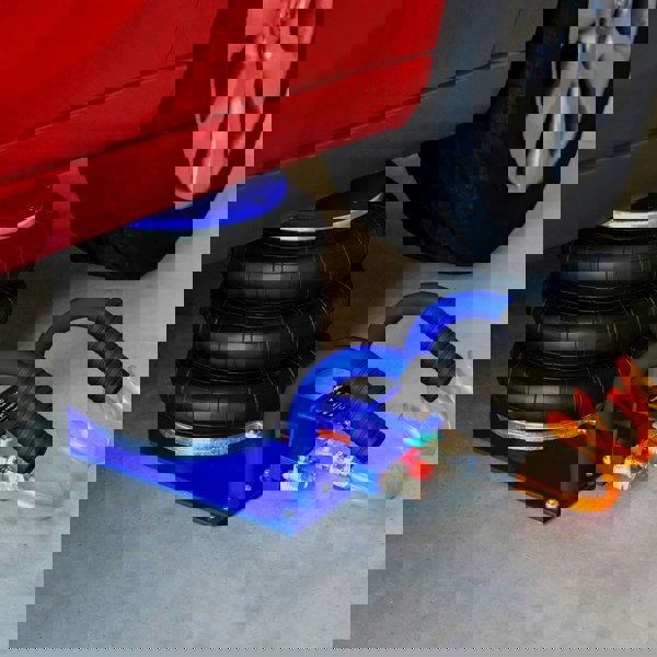 Air Bag Jack 3.5T with three black rubber air bags, blue hoses, and a sturdy base, designed for vehicle lifting and support