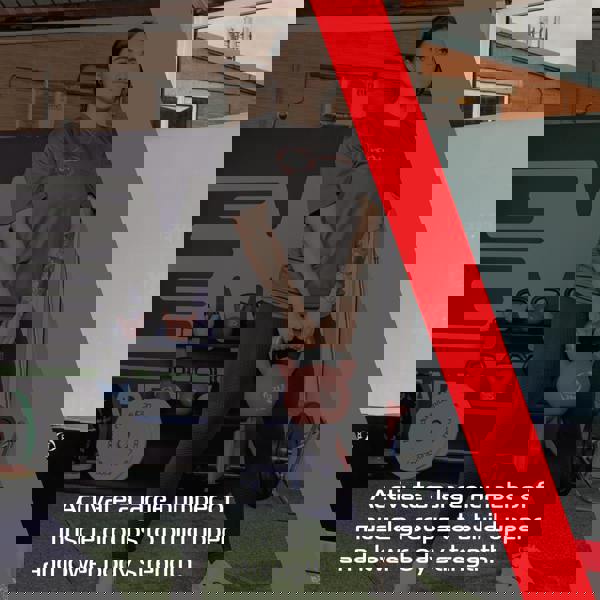 Body Revolution 12kg neoprene kettlebell held by a person in a gym, featuring a smooth texture and vibrant color for effective workouts