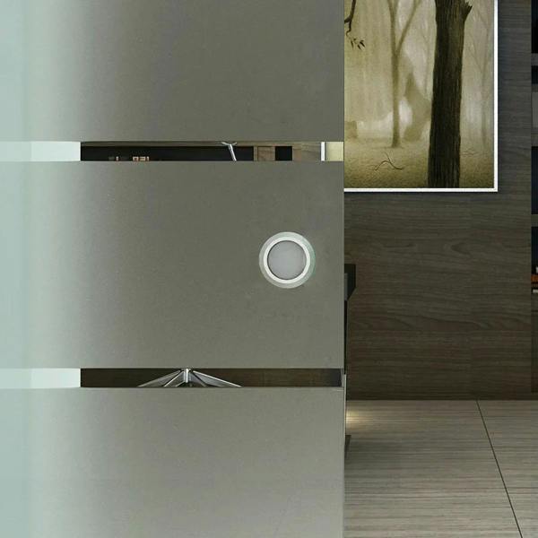 Round handle on frosted tempered glass sliding door panel with stripe pattern