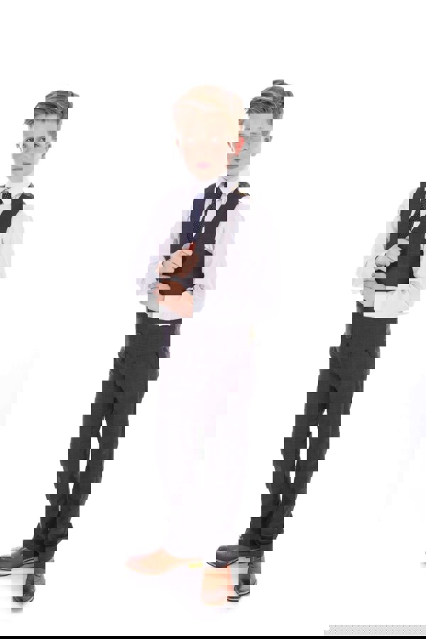 young boy wearing grey suit