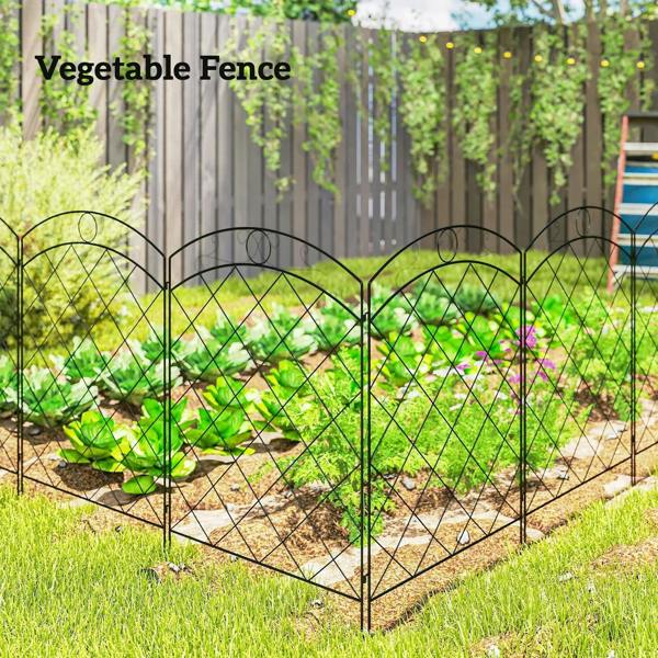 Black steel fence panels for raised garden bed, diamond wire mesh with arched tops.