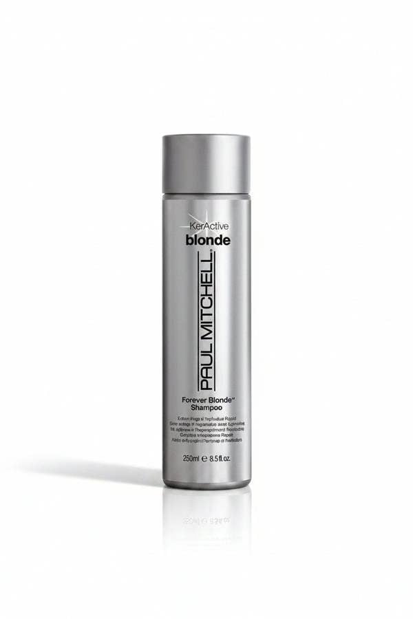 Shampoo bottle labeled 'Paul Mitchell' on a white background