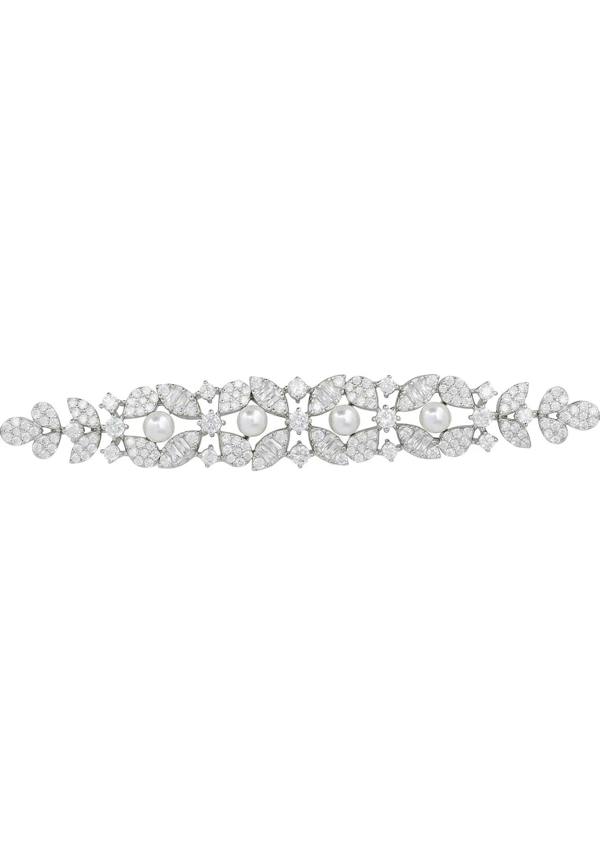 Floral diamond bracelet with pearls.