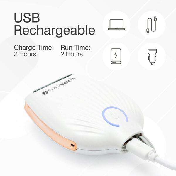 The Rio GO SMOOTH Lady Shaver in white charges via USB. Image text highlights USB Rechargeable, 2-hour charge and run time, and icons for flexible charging—ideal for smooth, effortless shaving anywhere.