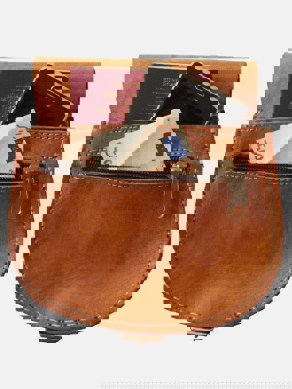 The Temara Small Saddle Bag in Tan Inside 