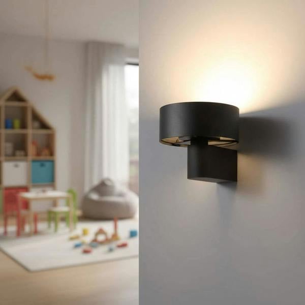 Black wall mounted interior light fixture on  a grey background in a children's playroom