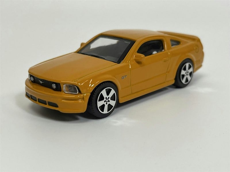 Burago 2006 Ford Mustang GT Orange 1:43 Scale - 183000