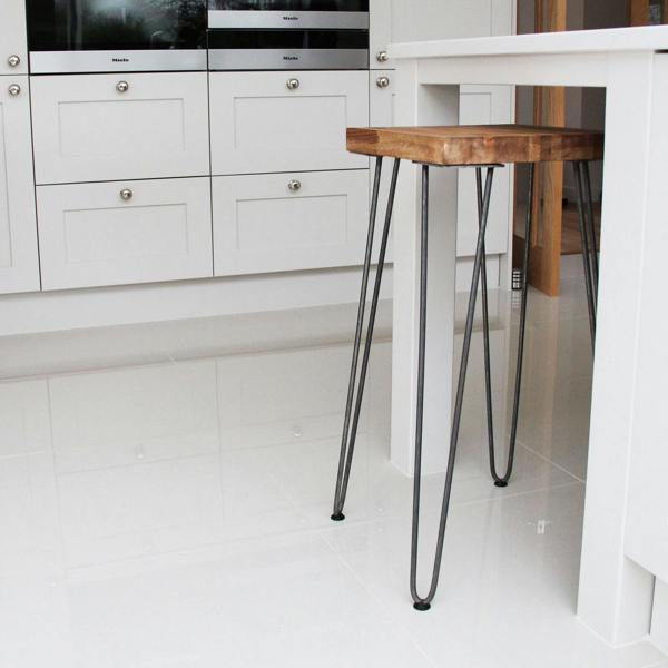 Grey 10mm hairpin leg feet protectors pack, designed to prevent scratches on floors, featuring a sleek, durable design for furniture stability