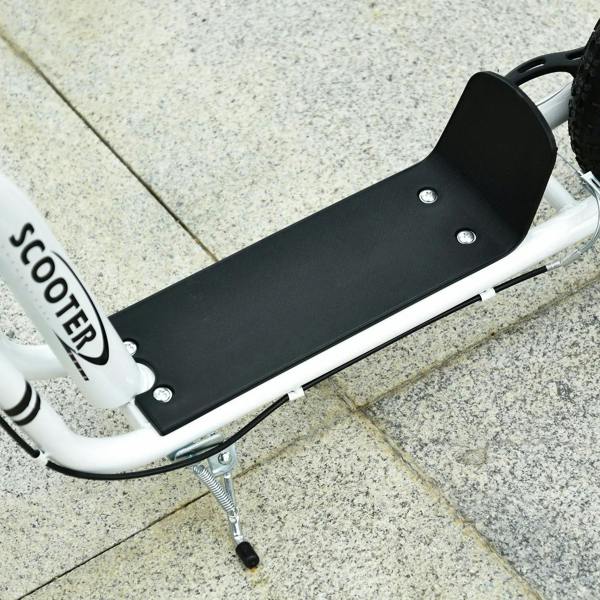 Black padded footplate on white kick scooter deck with kickstand