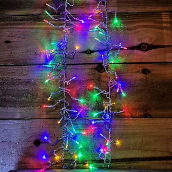Samuel Alexander 960 LED 12m Premier Cluster Indoor Outdoor Multi Function Mains Operated Christmas Lights with Timer on Clear Cable in Multicoloured