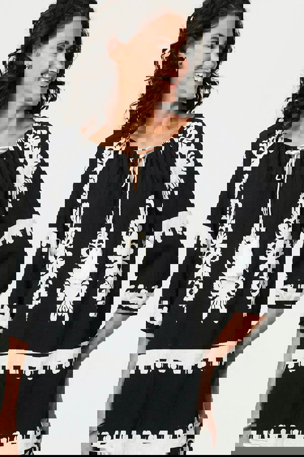 Black | Ikat Print Tassel Tie Neck Blouse
