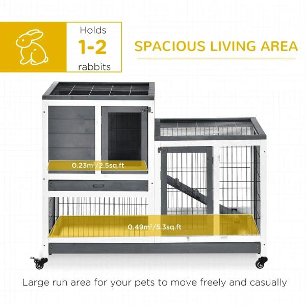 Grey wooden rabbit hutch with wire doors and open front access area, on rolling base