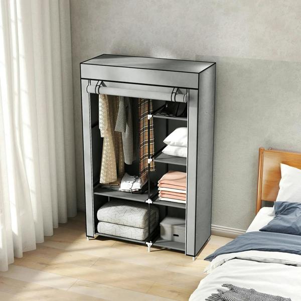 Light grey fabric wardrobe with open doors, hanging rail, and lower shelf storage