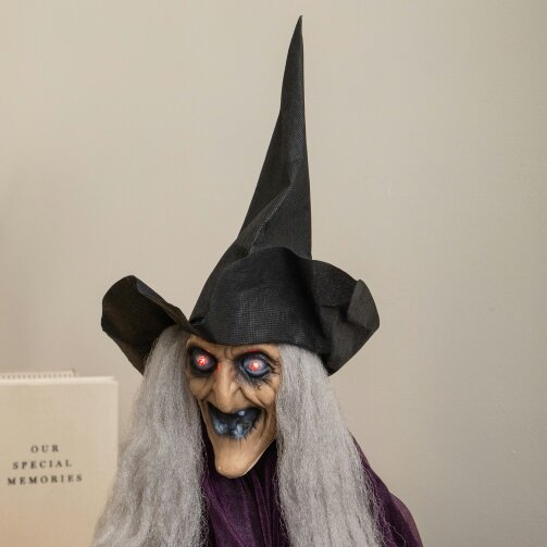 Samuel Alexander 90cm Animated Hanging Halloween Witch with Red Light Up Eyes & Sound