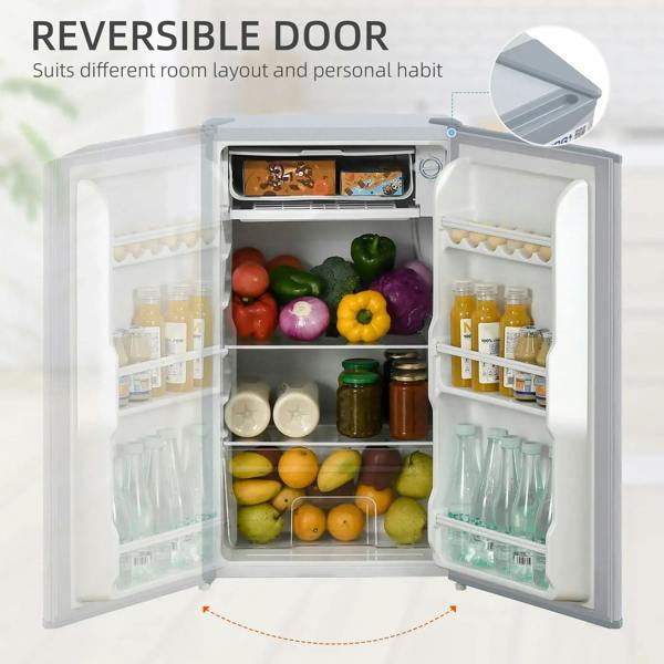 Fridge freezer with reversible door open, interior shelves and door racks visible