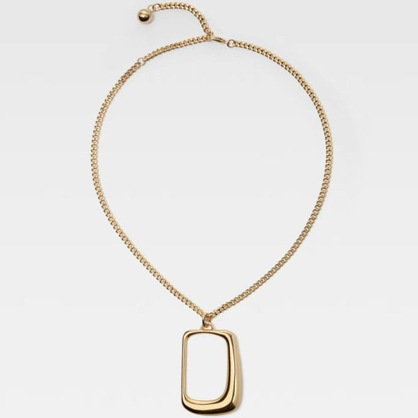 Jacquemus 'The Ovalo' J pendant necklace in a gold tone finish