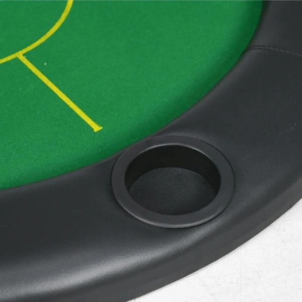 Close-up of green poker mat corner with round cup holder in black edge