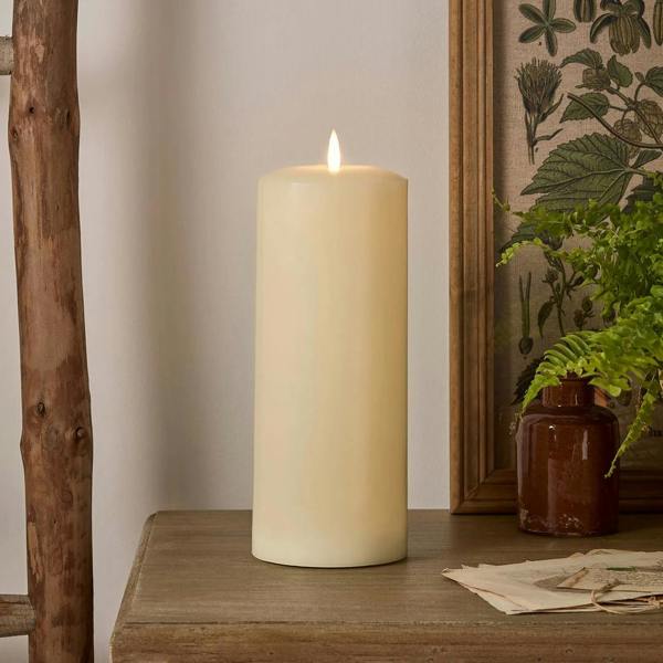 15cm TruGlow Ivory LED chapel candle with a realistic flame and real wax finish.