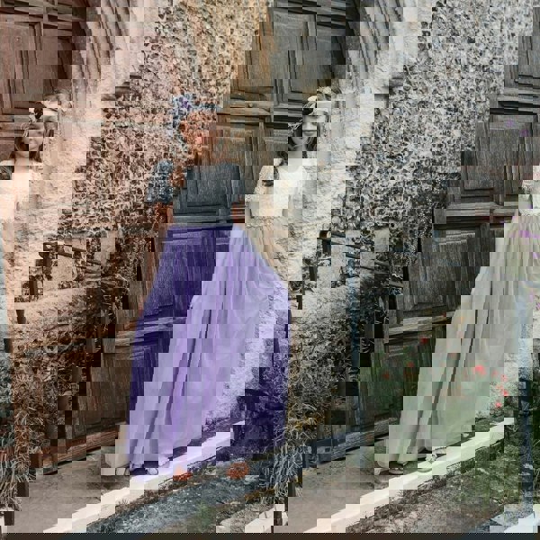 flower girl stood in church doorway