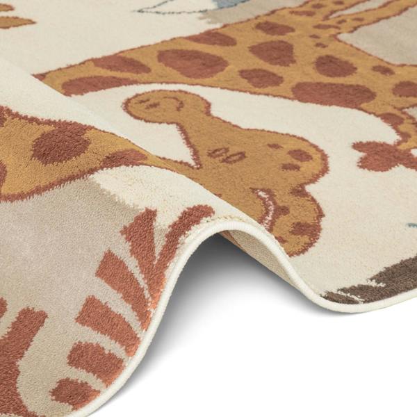 Close-up of a children's rug with giraffe design