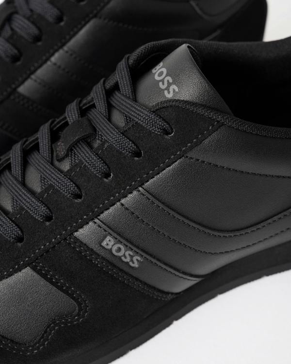 close up view of BOSS Orange Levon Runn pumi Mens Trainers in Black 005