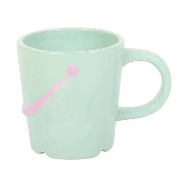 Mint bucket mug with pink arrow-dot decal and side handle