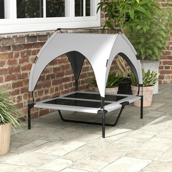 Light grey raised dog bed with breathable mesh canopy, open front, black support legs