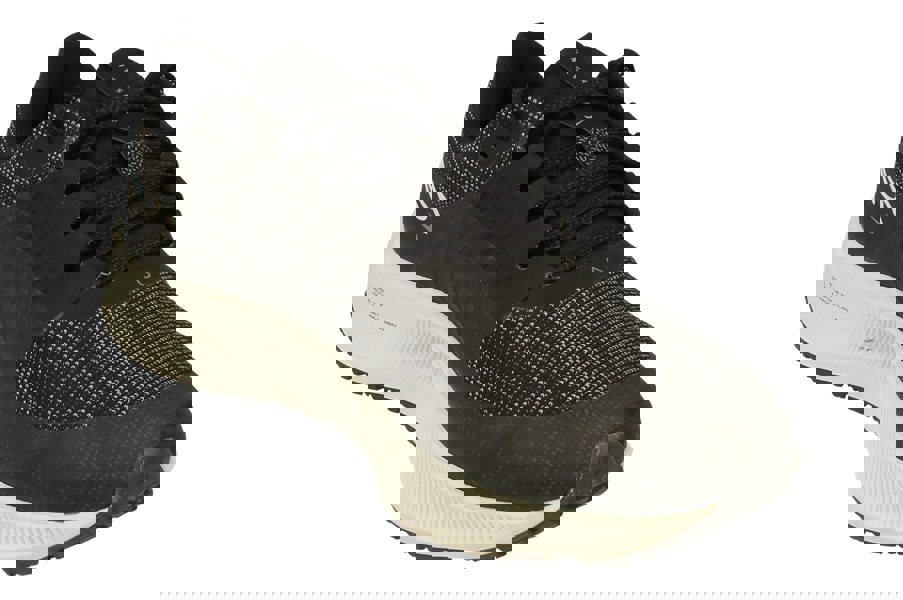 A front, right angle of the Nike Air Zoom Pegasus 38 Shields. This angle showcases the Storm-Tread outsole.