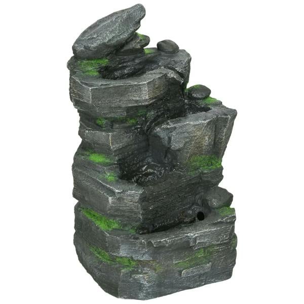 Dark grey stacked rock water fountain with green moss accents and small LED glow