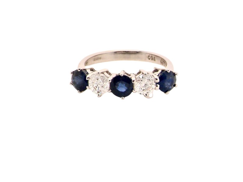 Vintage Tom An impressive five stone Sapphire and Diamond ring