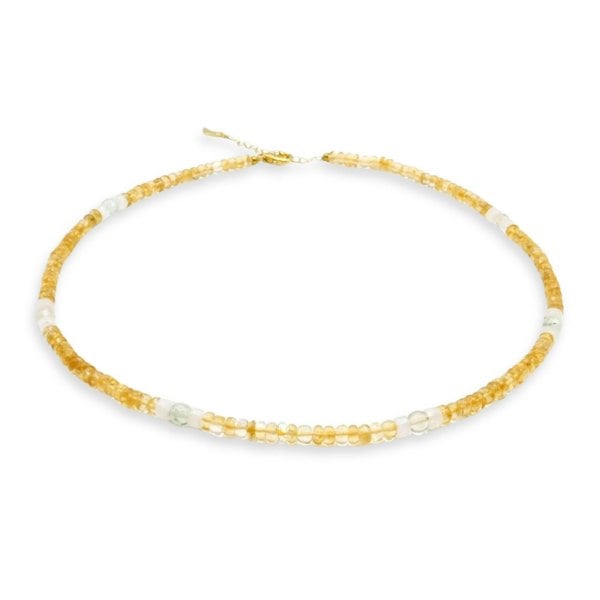 Kati Kaia citrine crystal set for meditation necklace with yellow and clear beads on white background