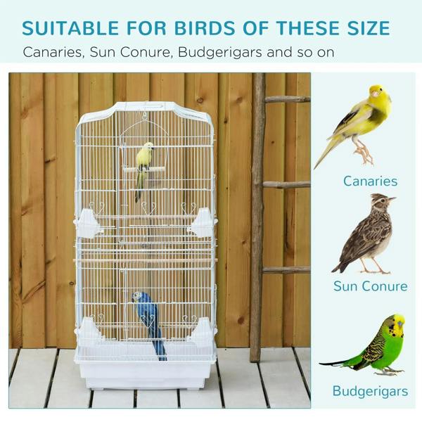 Large white metal bird cage with interior perches and feeding cups for small birds