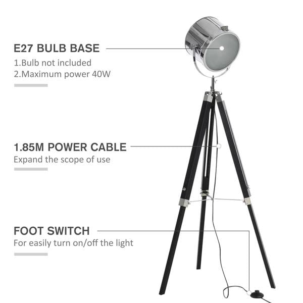 Chrome searchlight floor lamp with black tripod legs and foot switch