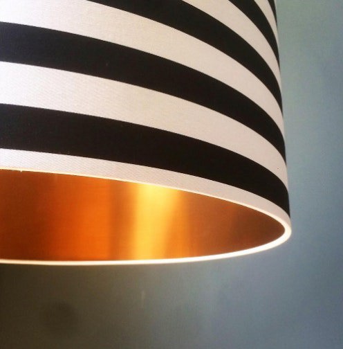 Close up of our circus stripes and gold lining lampshade