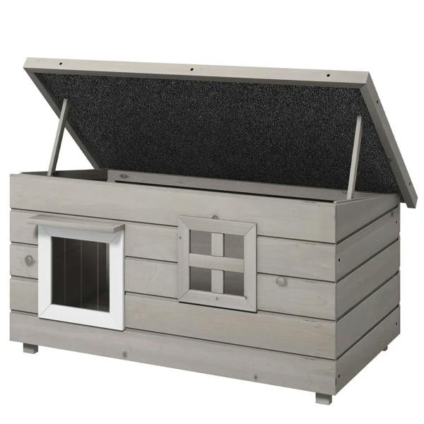 Grey wooden cat house with asphalt roof and two front windows, elevated legs