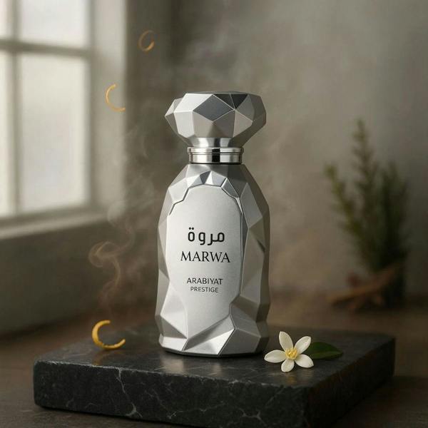 Arabiyat Prestige Marwa Eau de Parfum 100ml for Men bottle on black stone with flower