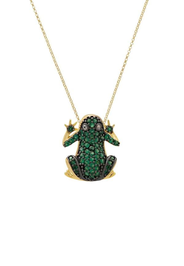 Frog-shaped pendant with green gemstones on a gold chain against a white background