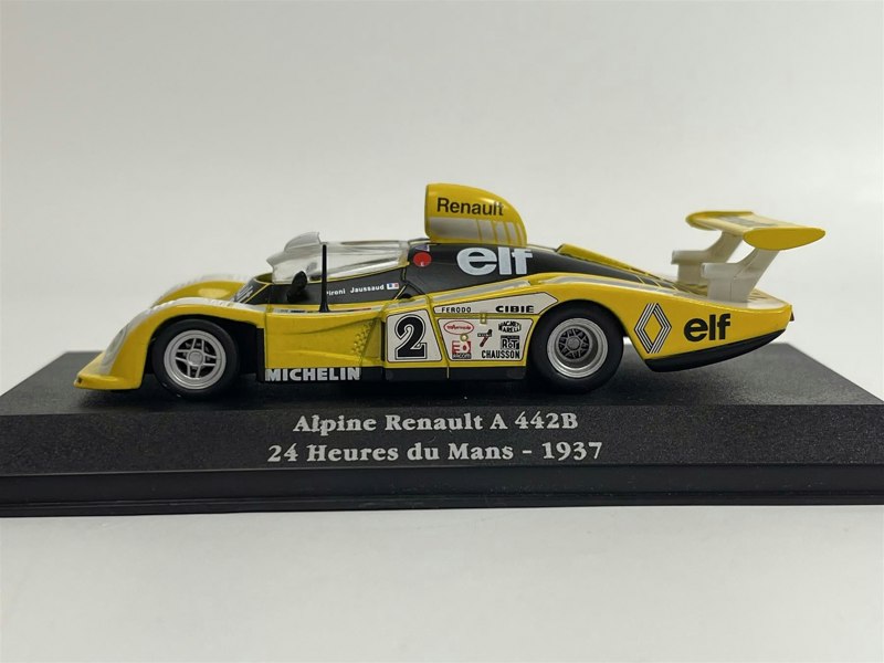 a yellow toy race car