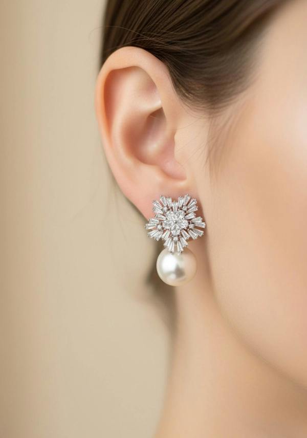 Close-up of the earring worn by a model.
