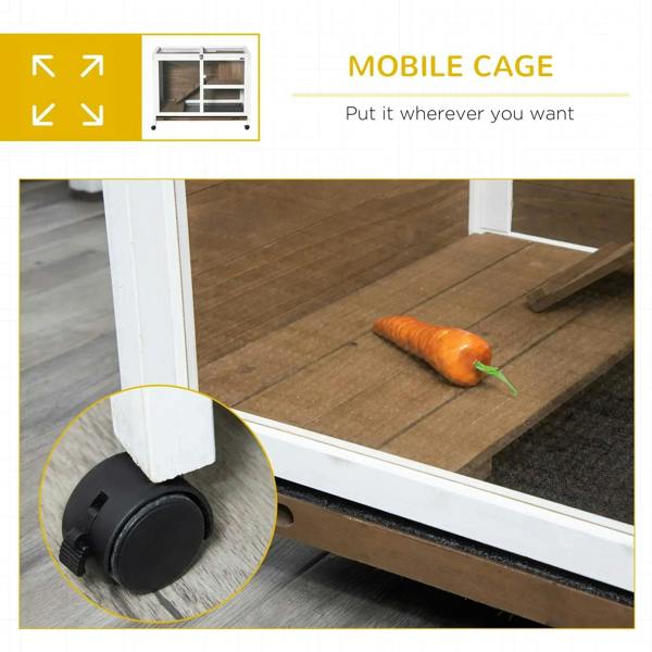 Brown rabbit hutch on wheels with lower panel and wooden ramp inside