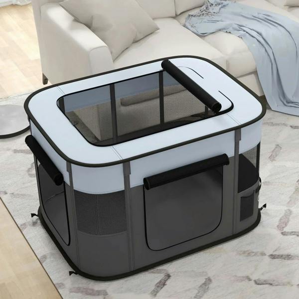 Grey foldable dog pen with mesh walls, front zip door, and top black handle rail