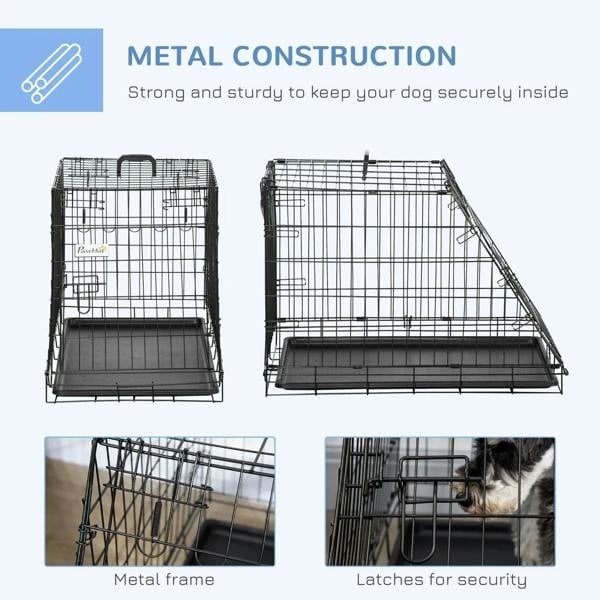 Black metal dog crate with folding frame and secure latches, tray base
