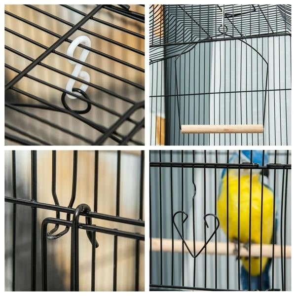 Black metal bird cage close-up of wire bars and secure side handle