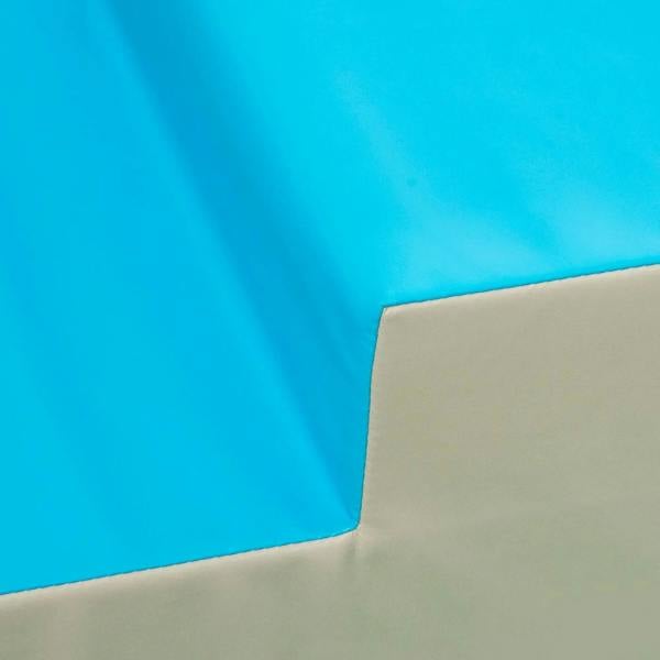 Blue foam mat corner and seam with beige side panel
