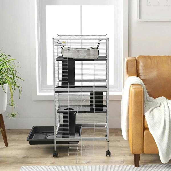 Light grey small animal wire play cage with hammock, ramp, and platforms, wheeled