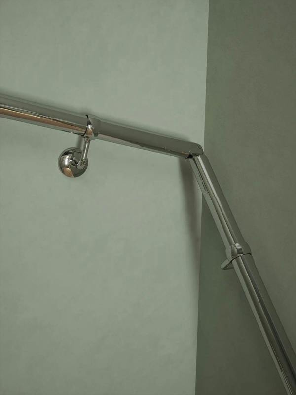 The Radway Chrome double winder handrail system elbow and brackets