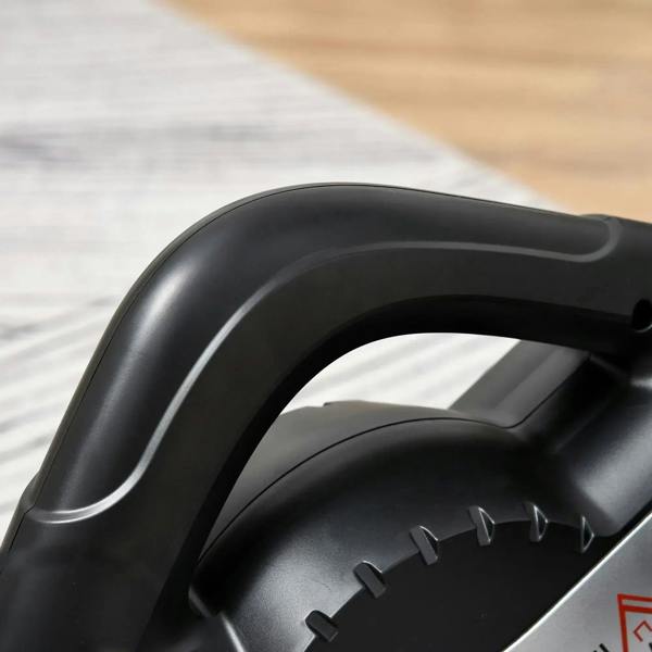 Close-up of black handle frame and textured pedal platform on a mini pedal exerciser