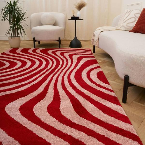 Red and pink wavy striped patterned rug
