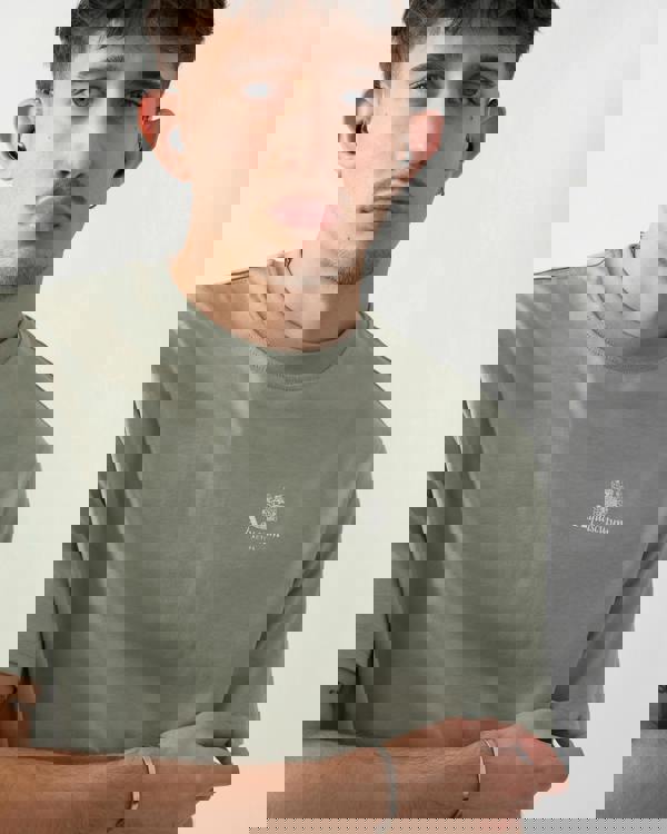 close up shot of a model wearing a Aquascutum Mens Small Logo T-Shirt in Salvia 34